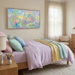 Gestural abstract expressionist hand-painted canvas in vibrant multicolored brushstrokes and layered pastels, modern bedroom setting