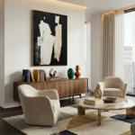 Gestural abstract hand-painted canvas in monochromatic black and cream with dynamic white figure, contemporary living space