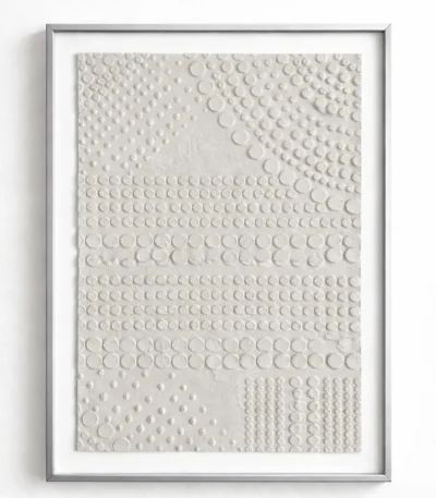 Textured abstract wall art in dimensional cream tones with layered circular motifs, hand-finished canvas in contemporary space