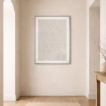 Textured minimalist hand-painted canvas with layered tactile patterns in cream and ivory tones, contemporary entryway
