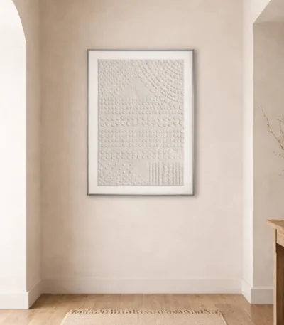 Textured minimalist hand-painted canvas with layered tactile patterns in cream and ivory tones, contemporary entryway