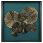Contemporary textured wall art featuring layered brass-toned circular medallions on deep teal canvas