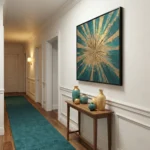 Abstract hand-painted canvas with radiating gold and teal starburst pattern, hallway accent