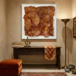 Textured abstract hand-painted canvas in warm terracotta and golden ochre tones, contemporary entryway
