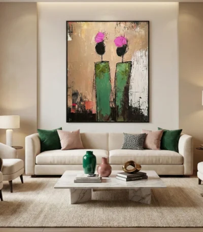 Contemporary abstract hand-painted canvas depicting two stylized figures with magenta heads and green bodies, textured earth tones, modern living space