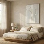 Minimalist abstract hand-painted canvas with geometric cream and ivory forms, contemporary bedroom setting