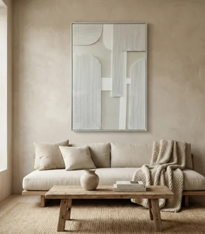 Minimalist abstract hand-painted canvas with vertical ribbed textures and geometric forms in cream and white, contemporary living space