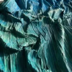 Gestural abstract hand-painted canvas with layered teal and seafoam brushstrokes, dynamic movement in cool tones