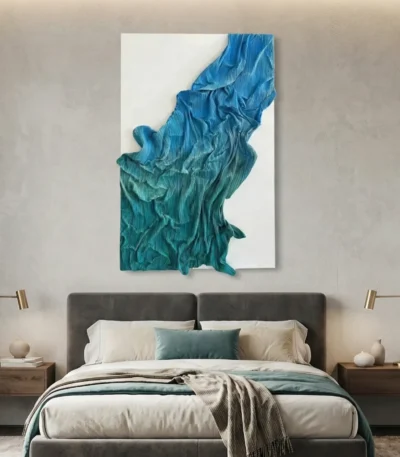 Textured abstract hand-painted canvas in layered teal and blue gestural brushstrokes, contemporary bedroom setting