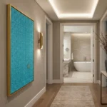 Textured teal abstract hand-painted canvas with intricate damask patterns in gold frame, modern hallway
