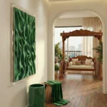 Textured abstract hand-painted canvas with layered green organic forms and subtle wave patterns, luxury bedroom setting