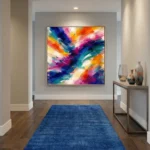 Gestural abstract expressionist hand-painted canvas in vibrant multicolored brushstrokes, contemporary entryway