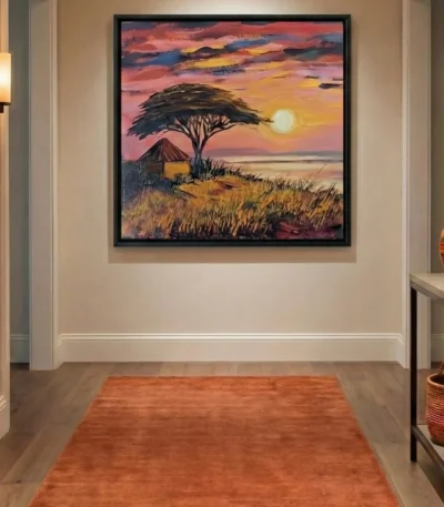 Figurative landscape hand-painted canvas depicting acacia tree and thatched hut at golden sunset in warm coral and ochre tones, contemporary entryway
