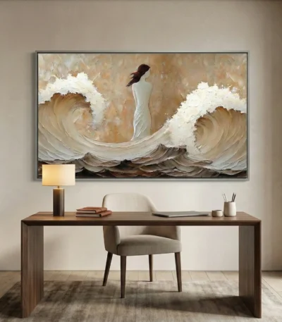 Textured figurative hand-painted canvas depicting woman amid crashing waves in cream and warm earth tones, contemporary workspace
