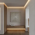 Minimalist hand-painted canvas with radiating linear pattern in neutral grays and whites, contemporary entryway