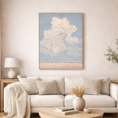 Impressionist hand-painted canvas depicting towering cumulus clouds against soft blue sky and sandy horizon, contemporary living space