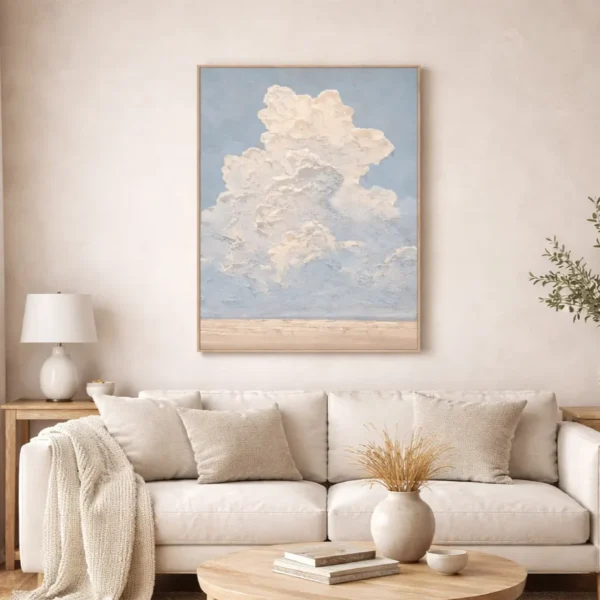 Impressionist hand-painted canvas depicting towering cumulus clouds against soft blue sky and sandy horizon, contemporary living space