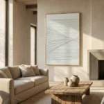 Minimalist hand-painted canvas with gestural white linear brushstrokes in soft grey tones, contemporary living space