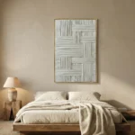 Textured abstract hand-painted canvas in layered grey and white linear patterns, contemporary bedroom