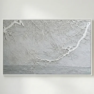 Textured hand-painted canvas depicting frost-laden branches extending over still water in monochrome whites and grays, contemporary living space