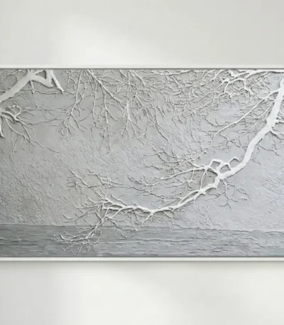 Textured hand-painted canvas depicting frost-laden branches extending over still water in monochrome whites and grays, contemporary living space