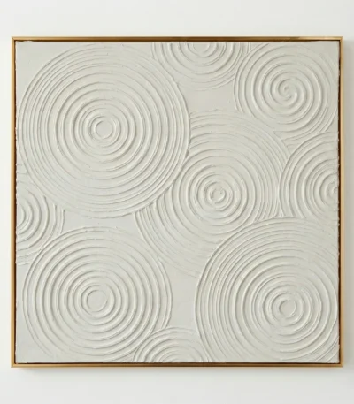 Textured abstract hand-painted canvas with interlocking concentric circles in cream and white, contemporary living space