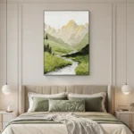 Contemporary landscape hand-painted canvas depicting mountain valley with river, golden peaks and verdant green palette, modern bedroom