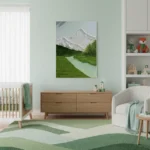 Contemporary landscape hand-painted canvas depicting snow-capped mountain peak, verdant forest, and turquoise river in cool greens and whites, nursery setting
