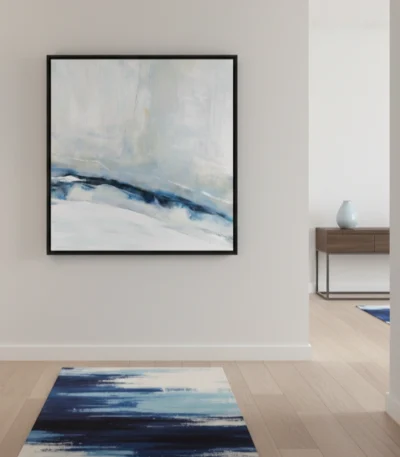 Layered abstract hand-painted canvas in soft whites, blues, and deep navy with gestural brushstrokes, contemporary interior
