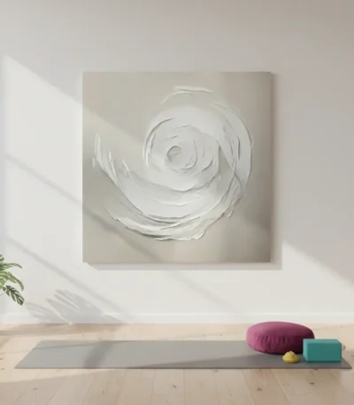 Textured abstract hand-painted canvas depicting a spiraling white rose form in monochromatic tones, yoga studio setting