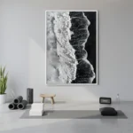 Monochromatic abstract landscape hand-painted canvas with dramatic contrast between luminous whites and deep blacks, contemporary studio setting