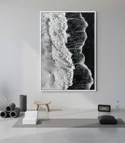 Monochromatic abstract landscape hand-painted canvas with dramatic contrast between luminous whites and deep blacks, contemporary studio setting