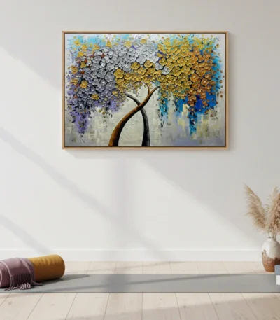 Textured abstract hand-painted canvas featuring an expressive tree with cascading silver, gold, and blue foliage, contemporary living space