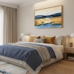 Contemporary landscape hand-painted canvas depicting golden fields and stormy skies with solitary tree, warm and cool tones, modern bedroom
