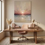 Impressionist seascape hand-painted canvas capturing golden sunset over waves in soft pink and cream tones, modern office setting