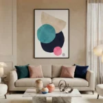 Contemporary abstract hand-painted canvas featuring layered geometric circles in teal, navy, blush and cream, modern living space