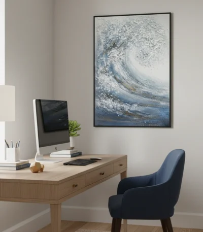 Textured abstract hand-painted canvas depicting rolling ocean wave in layered blues and whites, modern office setting