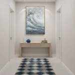 Textured abstract hand-painted canvas depicting dynamic ocean wave in layered blues, whites and grays, contemporary entryway