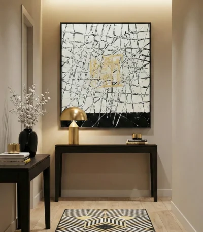Abstract expressionist hand-painted canvas with gestural black lines and gold leaf accents, cream and charcoal palette, contemporary entryway