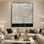 Contemporary abstract hand-painted canvas with gestural black lines and ochre accents on cream, modern living space