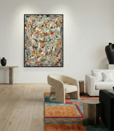 Abstract expressionist hand-painted canvas with gestural brushstrokes in warm ochre, burnt orange, and muted green tones, contemporary living space