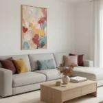 Gestural abstract hand-painted canvas with layered red, blue, yellow and cream brushstrokes, contemporary living space