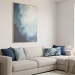 Contemporary landscape hand-painted canvas depicting cloudy sky in soft blues and whites, modern living space