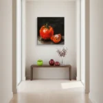 Contemporary still life hand-painted canvas depicting vibrant red tomato with slice against dark background, warm earth tones, modern entryway