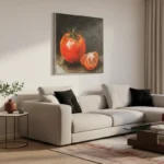 Figurative hand-painted canvas depicting vibrant red tomato with cross-section slice, warm ochre and charcoal tones, contemporary living space