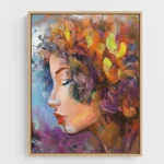 Gestural expressionist hand-painted canvas depicting a woman's profile with vibrant florals in warm oranges, purples, and yellows, contemporary interior setting