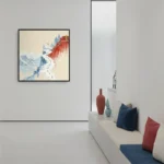 Contemporary landscape hand-painted canvas depicting the Great Wall winding through misty mountains in red and blue tones, modern interior setting