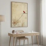Minimalist hand-painted canvas featuring a solitary red bird perched on an ink branch, cream and ochre palette, contemporary workspace