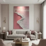 Contemporary landscape hand-painted canvas depicting pink-toned coastline with ocean waves and distant mountains, modern living space