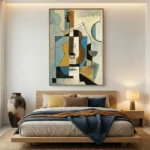 Cubist hand-painted canvas featuring abstract guitar and geometric shapes in blue, ochre, and black tones, modern bedroom setting